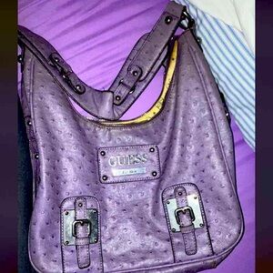 Purple guess over the shoulder bag